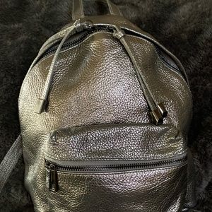 Neiman Marcus silver leather backpack with loop handle